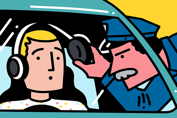 Driving pulled over by police for wearing headphones while driving