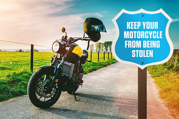 motorcycle sitting on side of country road